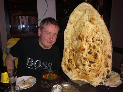 Ben Atkin enjoying a curry at Akbars, George Hudson St, York.